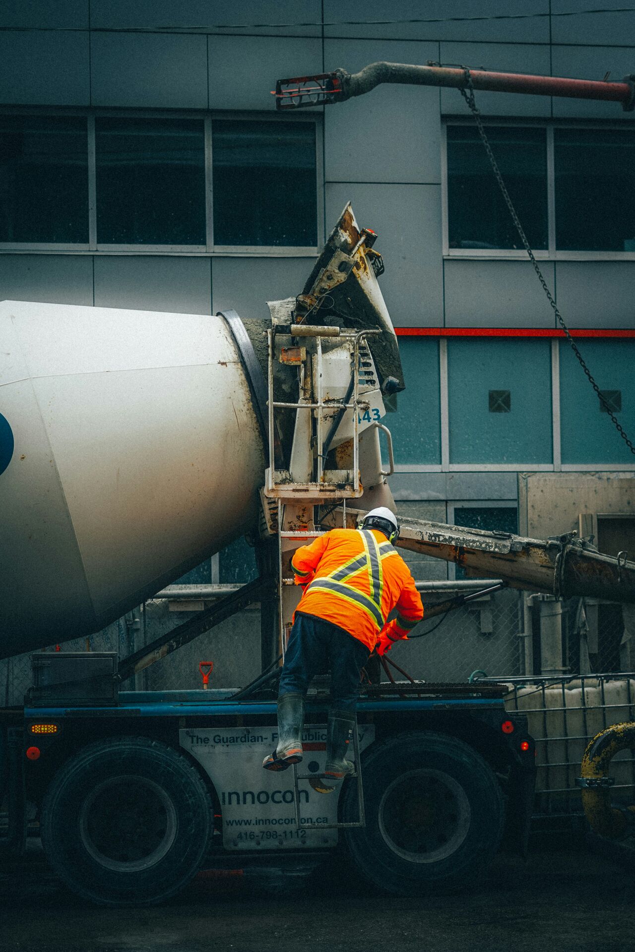 Concrete mixer truck being operated on a commercial site
